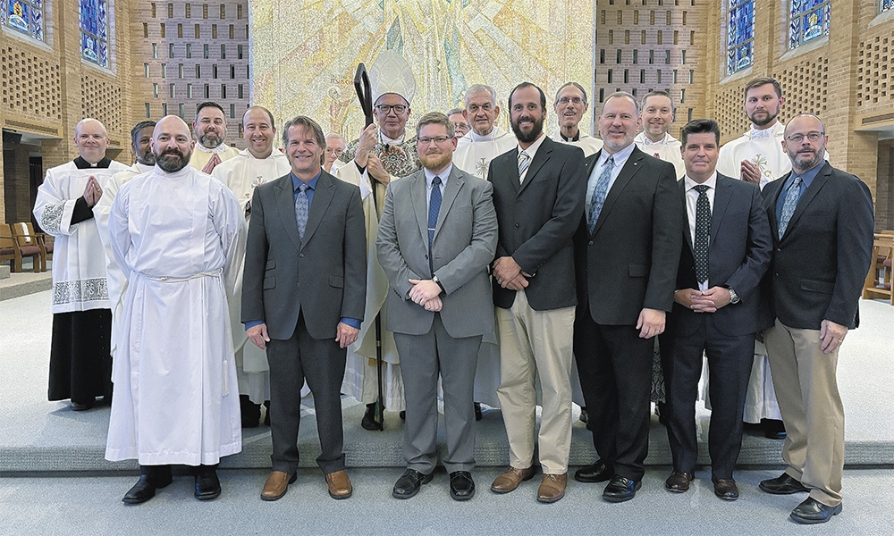 Seven men advance in deacon formation