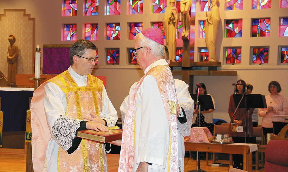 Bishop installs pastors